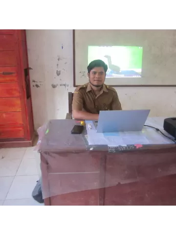 Roganda Simanjuntak, S.Pd